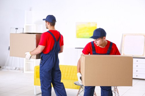 Removal team assisting with a home move in Holloway