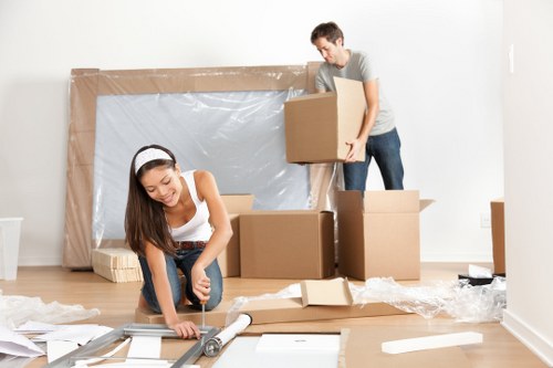 Professional furniture removals team loading items in Holloway