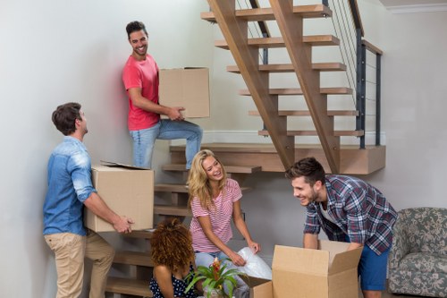 A local moving crew handling a flat relocation in Holloway