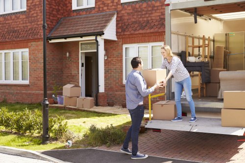 Office removals planning in Holloway with moving boxes and workspace layout
