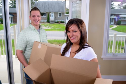 Packing and loading furniture into a removals van