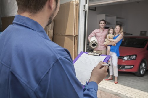 Office relocation equipment being transported by a removal van in Holloway