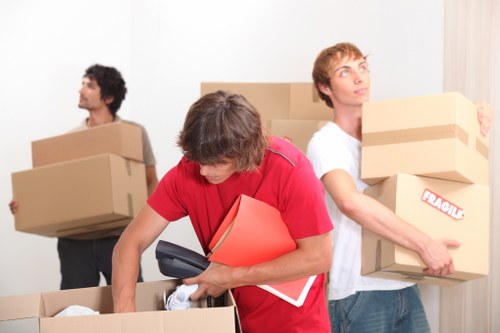 Moving boxes and furniture prepared for a Holloway removals service