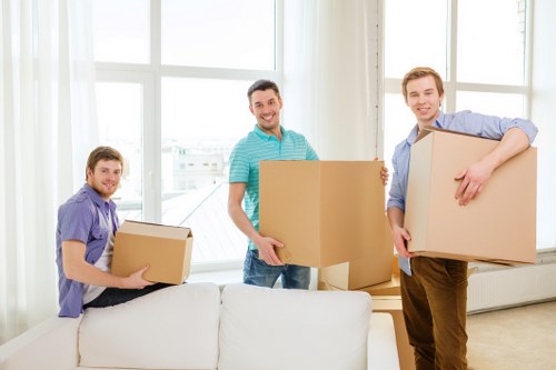 Packed office files and IT equipment prepared for a Holloway business move