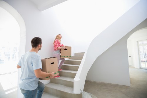 Office relocation planning in Holloway with moving boxes and workplace furniture