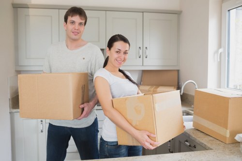 Packed moving boxes ready for urgent relocation in Holloway